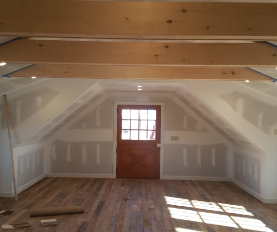 Interior Painting In Farmington 9 a room with a door and a window in it.