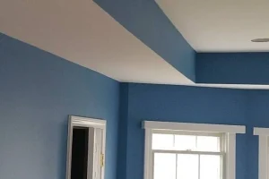 Blog 10 a room with blue walls and white trim.