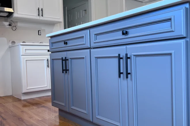 How Much Does It Cost To Paint Kitchen Cabinets In East Hampton, Connecticut? 3 A kitchen with blue cabinets and white counter tops.